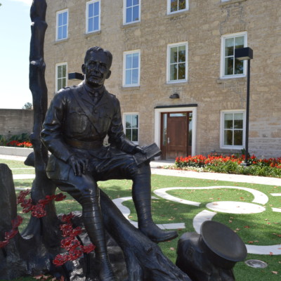 John McCrae statue outside of the Civic Museum.